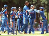 LONDON, ENGLAND - JULY 5 :   Jhulan Goswami of India (L) celebrates her wicket with team mates during the NatWest Women's Quadrangular Series between New Zealand and India at Southgate Cricket Club on July 5, 2011 in London, England.  (Photo by Jan Kruger/Getty Images)